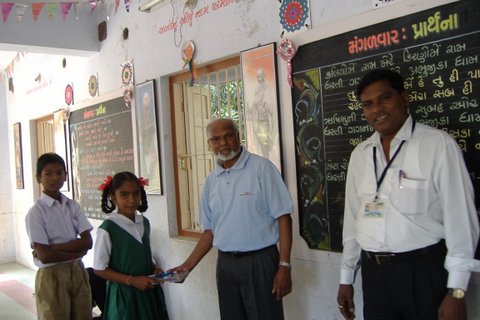 Keshavbhai meeting school children